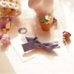 violet ribbon pin